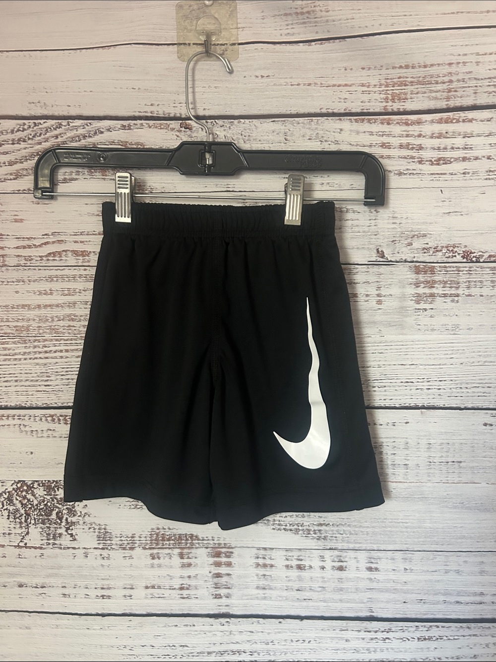Nike Black Kids Athletic Shorts with White Swoosh size 5